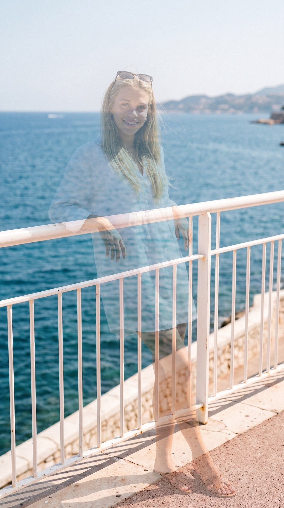 Before: the saved pose shows see-through over an empty seaside promenade, waiting for her to step in.